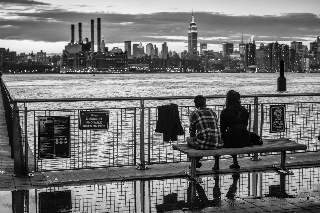 People sitting east river